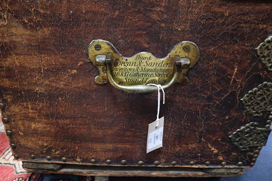 A 19th century studded leather trunk, by Morgan & Sanders (1801-20) (one handle with stamped patent mark) W.106cm